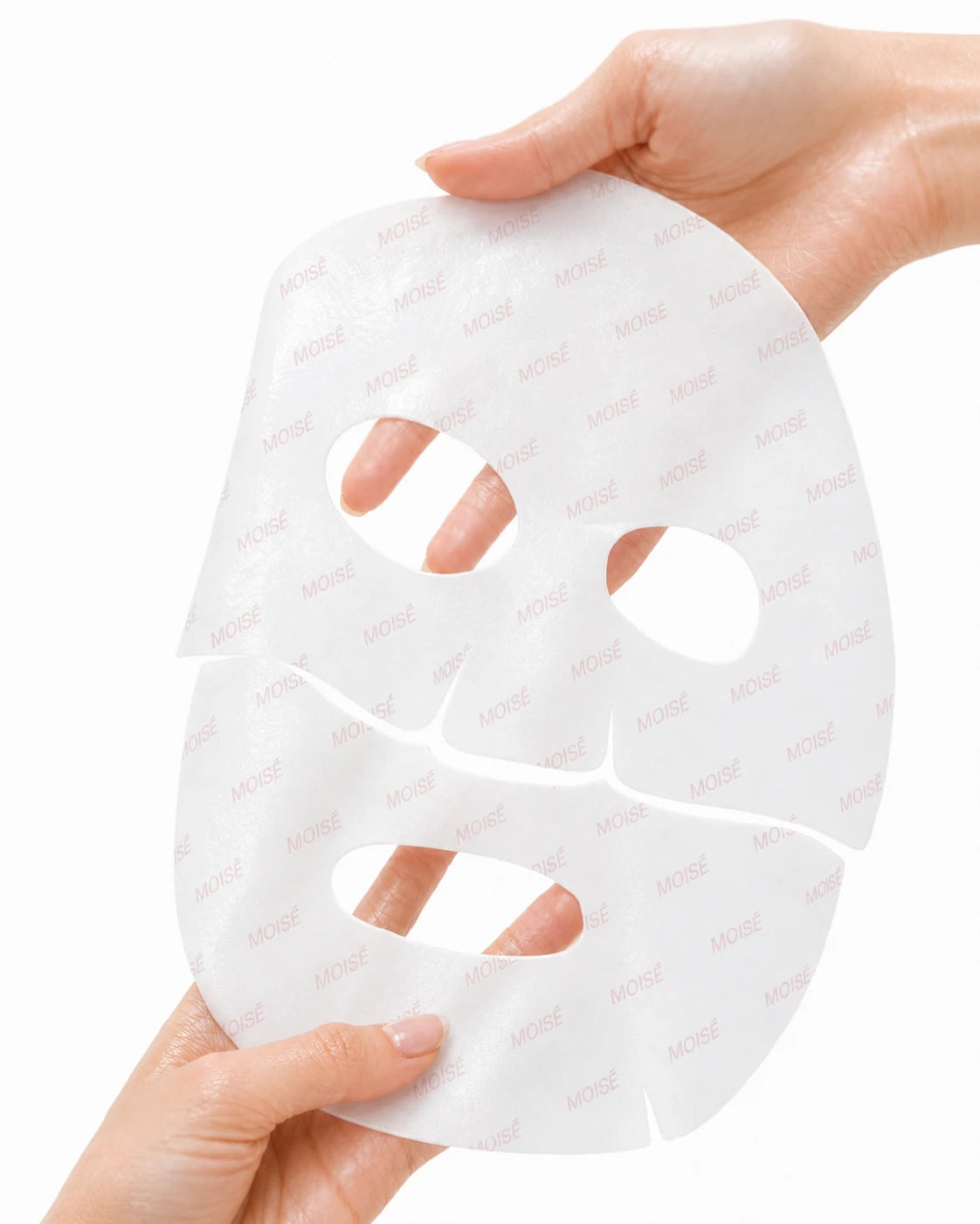 MOISĒ Lift & Refine Cream Wrapping Mask held in hands